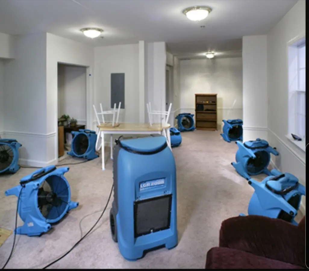 Air movers and dehumidifier setup for Water Damage Restoration in Yukon